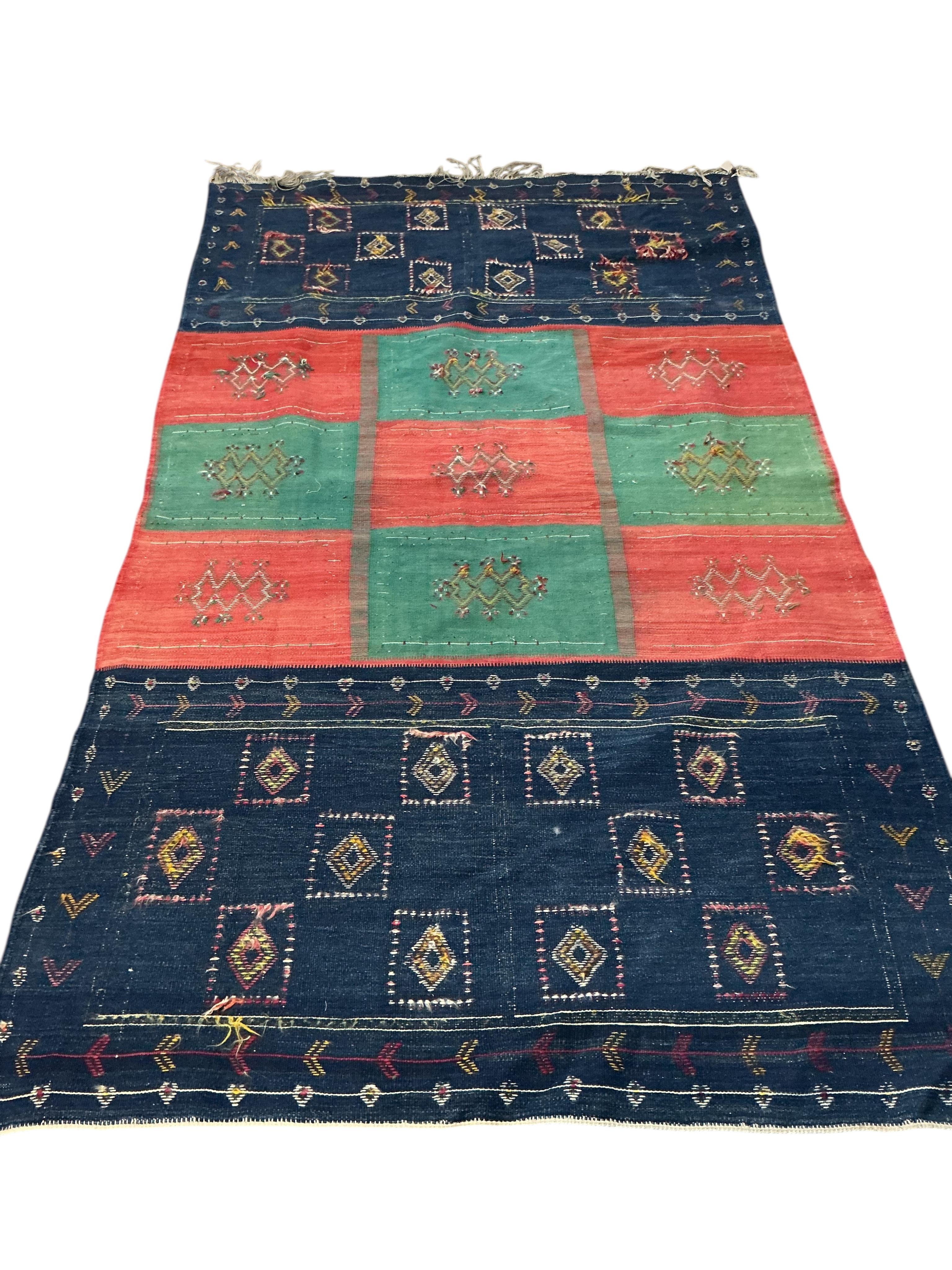 A Kilim polychrome flatweave carpet, 240 x 140cm